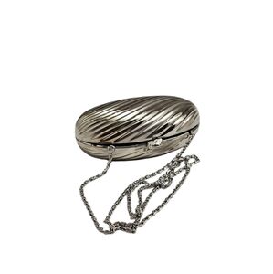 Evening bag, silver hard case.